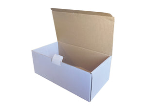 white gift boxes that close with a flap