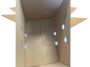 inside view of cardboard box with holes in the wrong place