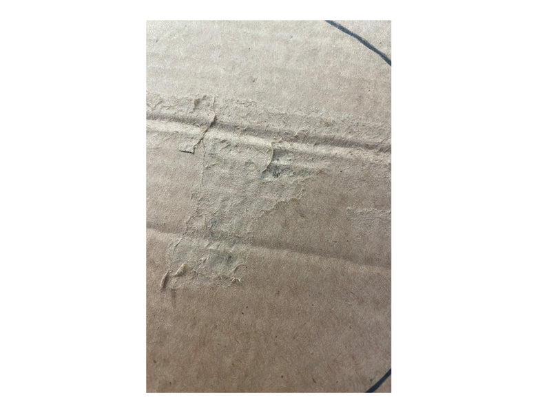 manufacturing error showing a scuff mark on some of the boxes