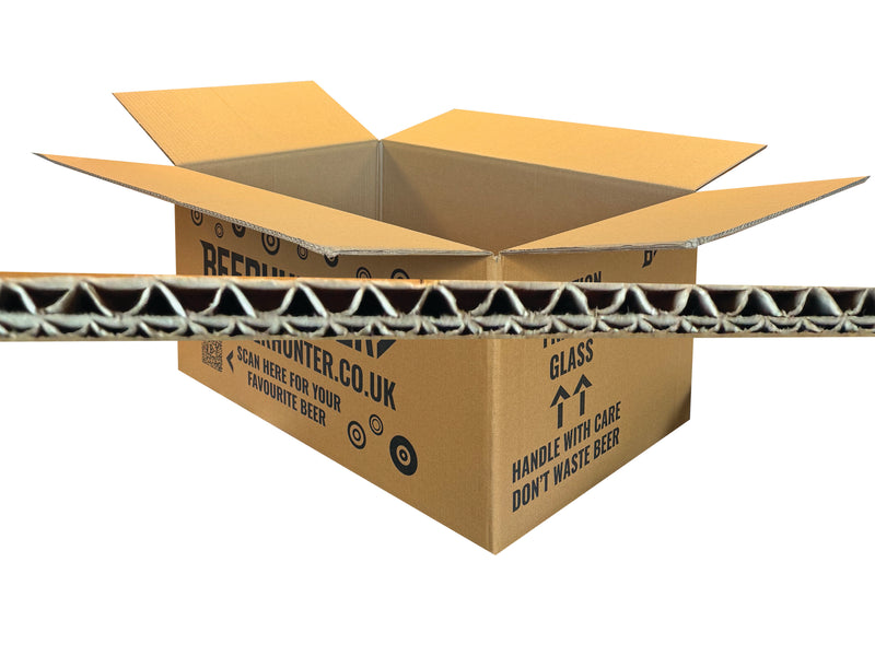 Cardboard box with printed text and a beer brand logo on a white background