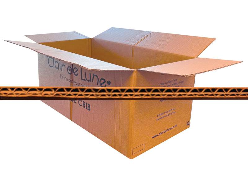 Large cardboard box with 'Clair de Lune' branding on a white background