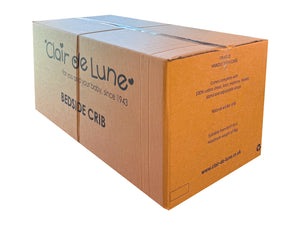 Cardboard box with 'Clair de Lune' branding on a white background