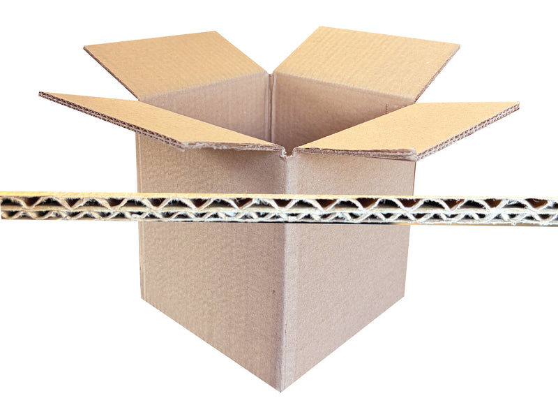 6 inch cubed cardboard box with a corrugated cardboard strip on a white background