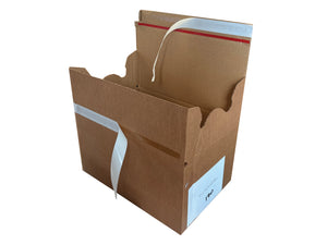 Cardboard box with tear-off, pre-glued strips