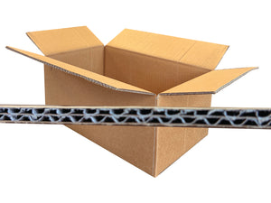 Open cardboard box with a close-up of the corrugated paper on a white background