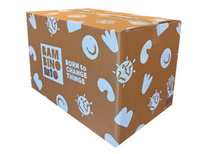 A brown cardboard shipping box with a playful pattern of light blue doodles and the text 'BAMBINOMIO BORN TO CHANGE THINGS' on a plain white background.