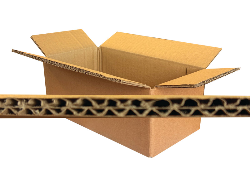 An open brown corrugated cardboard box shown on a white background, with a close-up horizontal strip of the cardboard wave pattern across the foreground.