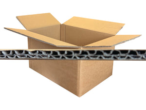 An open brown cardboard shipping box with flaps up, shown on a white background with a horizontal cross-section view of the corrugated cardboard wall in front.