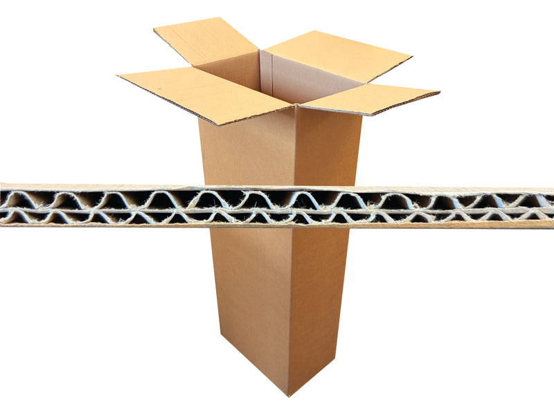 A 285mm x 180mm x 910mm cardboard box with a cross-section showing corrugated structure on a white background
