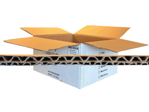 A white corrugated shipping box with its flaps open, shown on a white background with a horizontal close-up strip of the brown cardboard wave pattern across the middle.