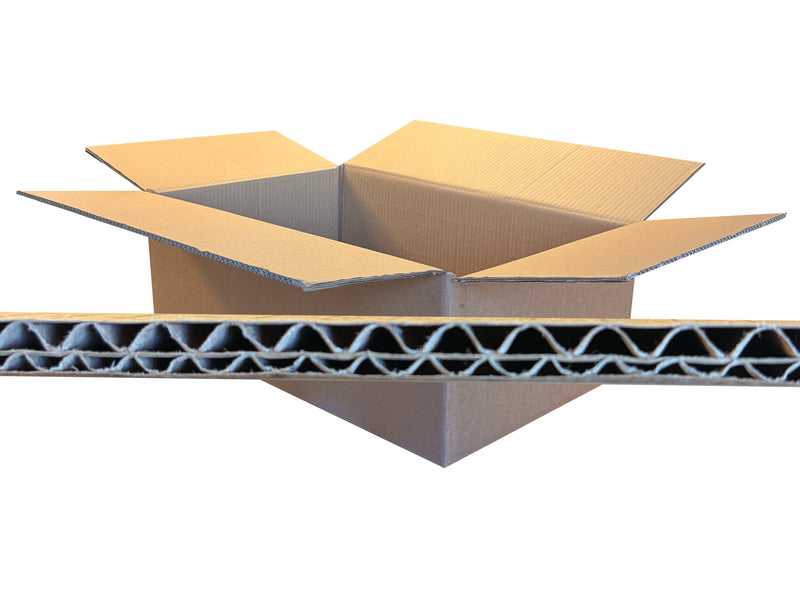 An open brown corrugated cardboard box with a horizontal cross-section of a double-walled cardboard panel shown in front, isolated on a white background.