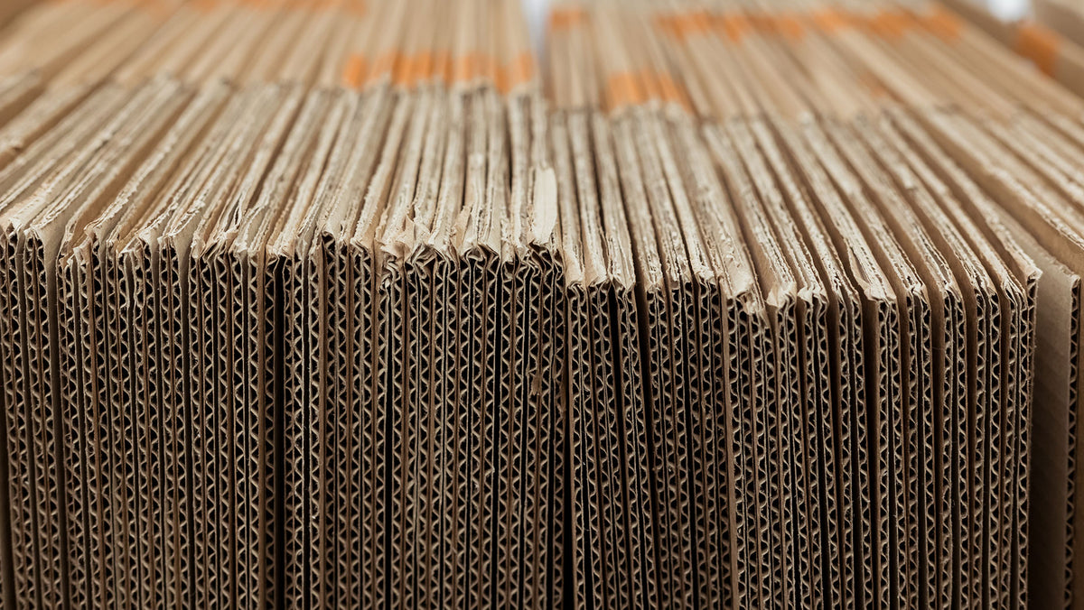 used cardboard boxes in a row